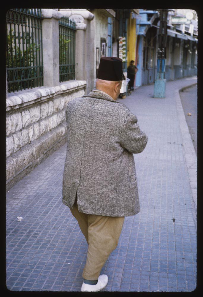 A gentleman wore a classic fez.