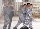 Ex minister Abdallah being taken to Jail Dec 10th 2003 An nahar.jpg
