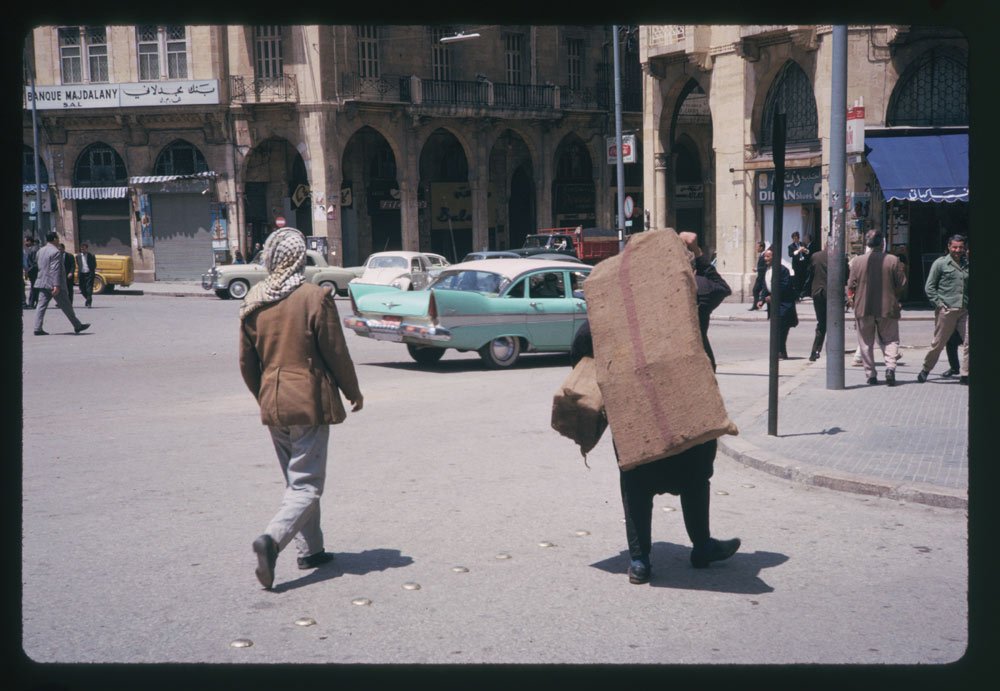 Check out that car in the background — it looks like a '50s Cadillac.